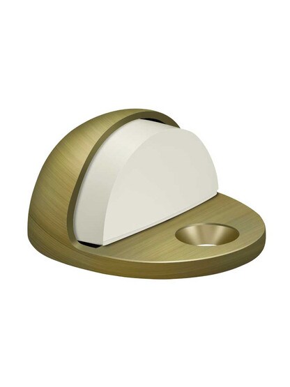 Floor-Mount Dome Door Stop in Antique Brass.